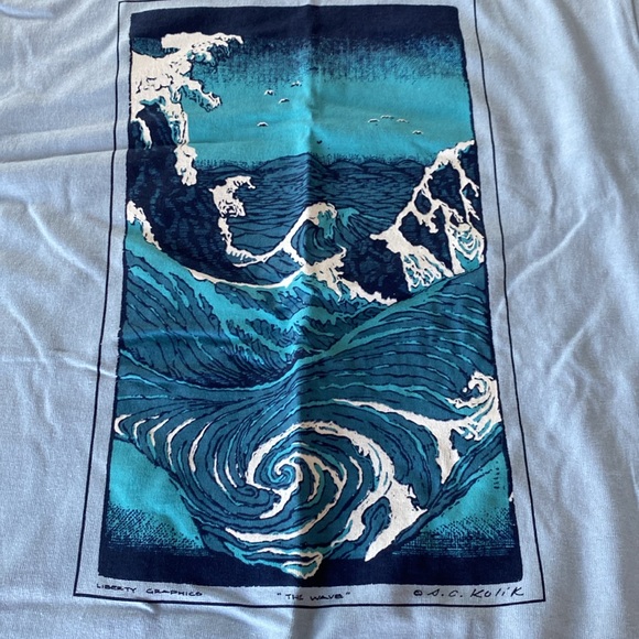 Women’s light blue T-shirt with wave emblem. Brand new! - Picture 2 of 4
